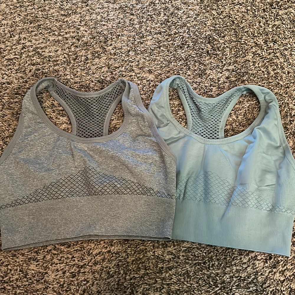 2 pack size M pro-fit sports bras